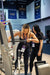 Athlete adjusting the Gluteleader Multi Hip GL-1009 training position